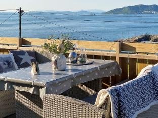 person holiday home in Tau