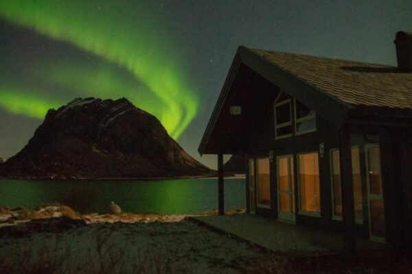See Lofoten mountains midnight sun and nothern lights in Steigen