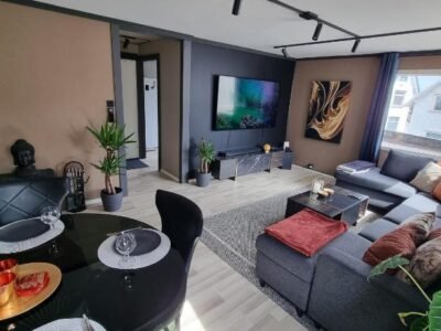 Large and central 2 bedroom apartment with Free parking, Free EV recharging and a private garden