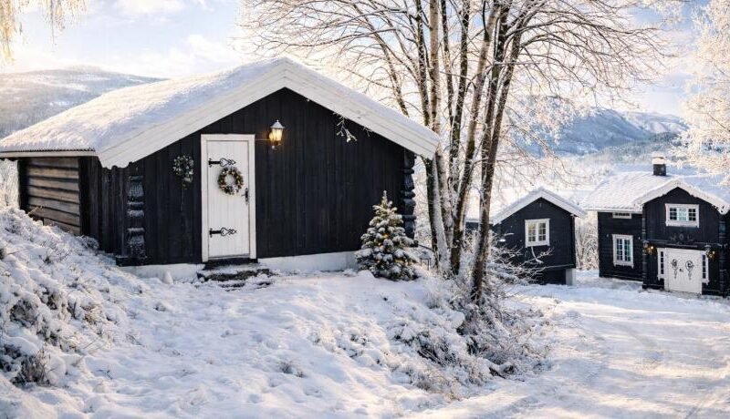 Sjarmerende tømmerhytte pa gardstun